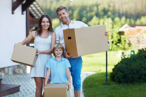 Packed office boxes and equipment ready for office removals in Tolworth
