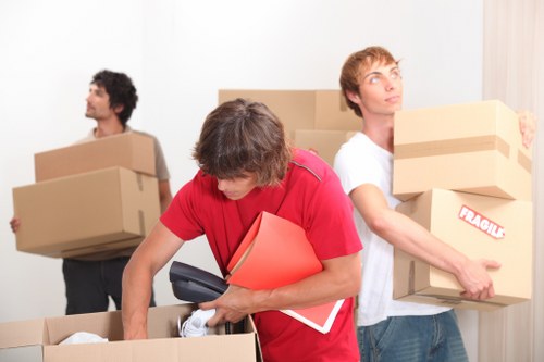 Business furniture and stock prepared for transport during a commercial move