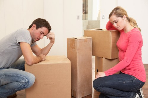 Careful loading of household items for transport in Tolworth