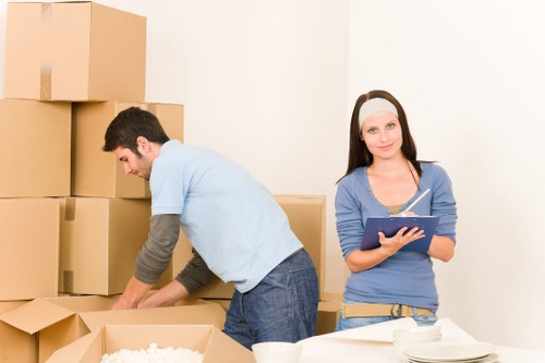 House move preparation checklist and packed boxes for Tolworth customers