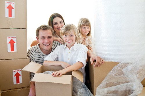Packed office equipment and furniture ready for a local commercial move