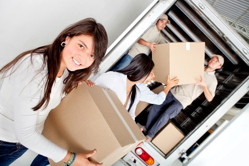 Unpacking boxes into a new home in Tolworth